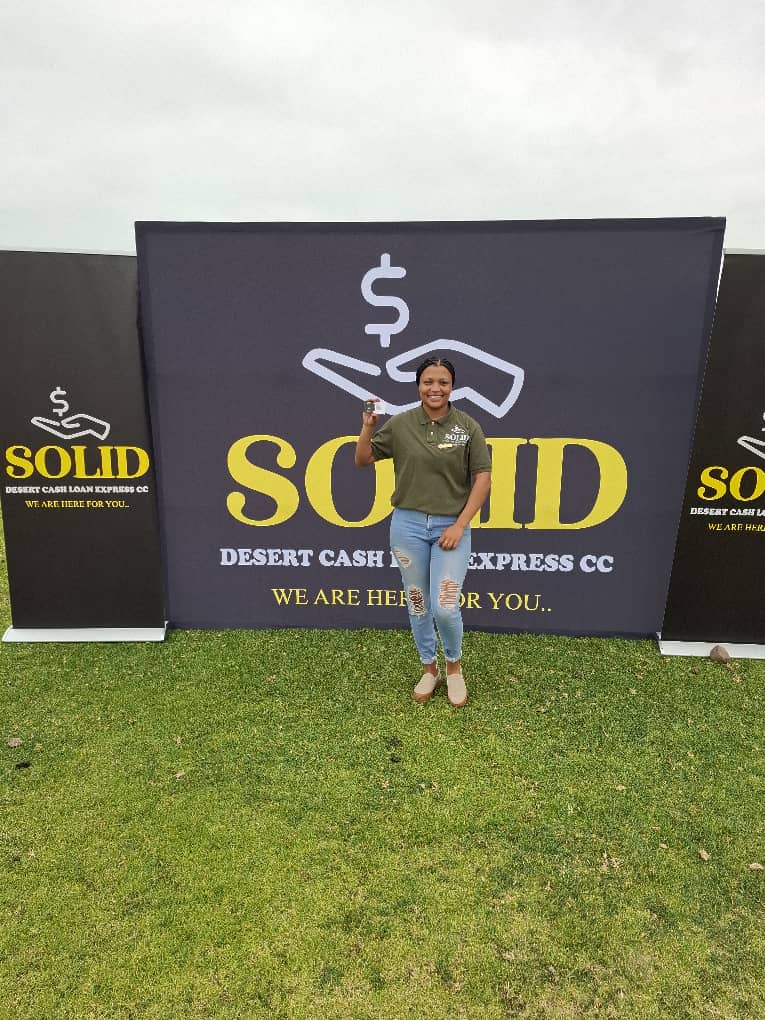 Woman holding promotional material